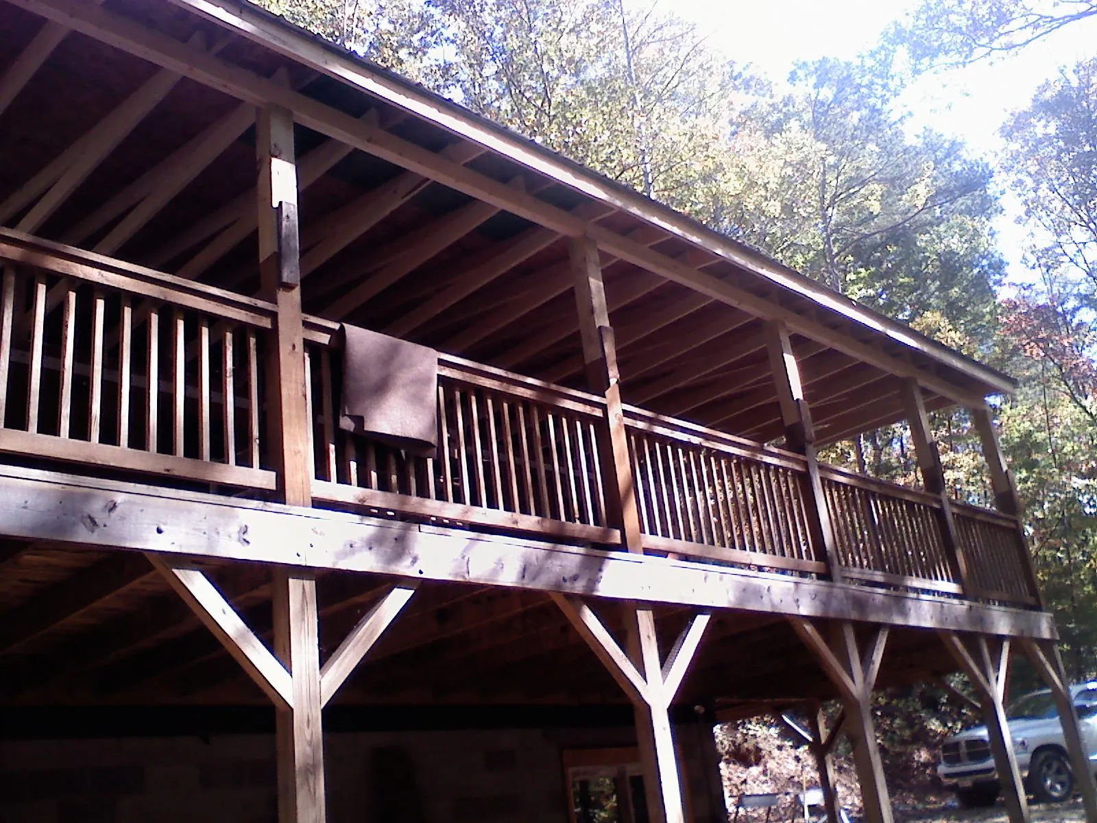Timber framing under a new elevated porch and deck — Roof Leak Repair in King City by Roofing Brothers